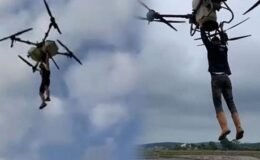 Çeltik tarlasında akılalmaz anlar! Tutunduğu dronla havalandı: Düşme anı kamerada