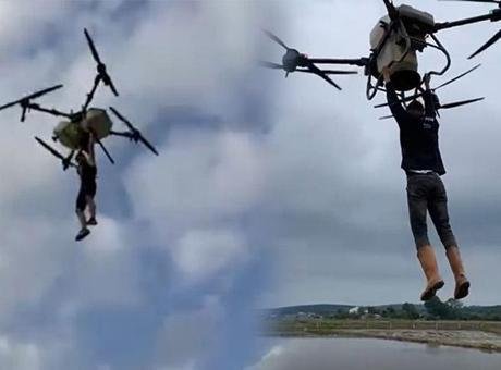 Çeltik tarlasında akılalmaz anlar! Tutunduğu dronla havalandı: Düşme anı kamerada